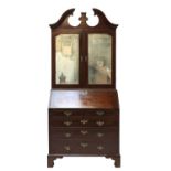 A George III mahogany bureau bookcase,