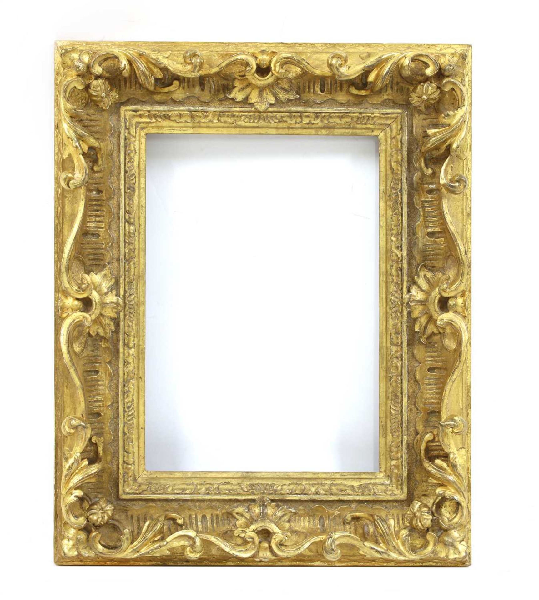 A carved giltwood picture frame,