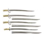 Four French brass-handled chassepot bayonets,