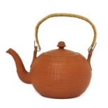 A Staffordshire redware globular tea kettle and cover,