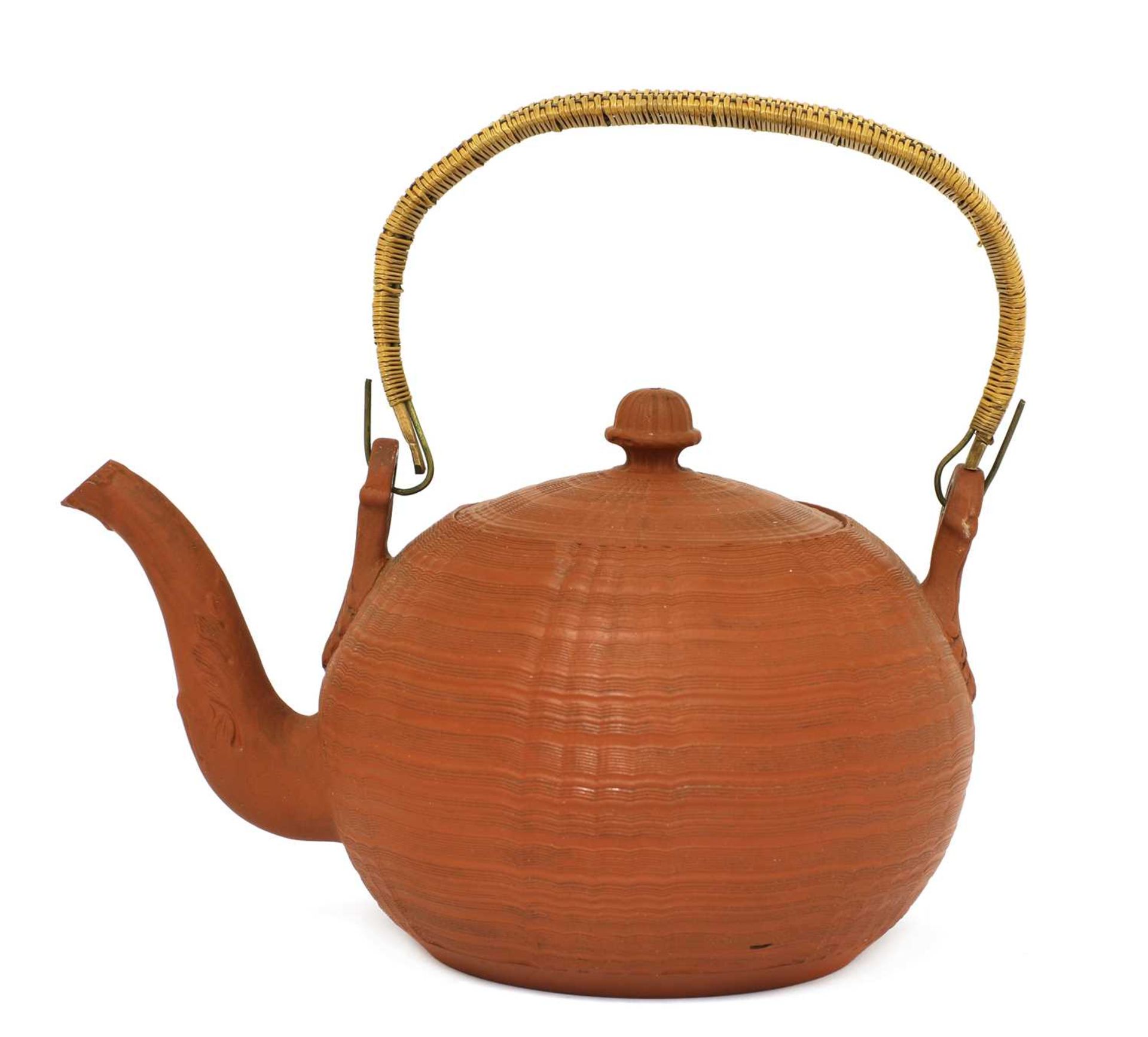 A Staffordshire redware globular tea kettle and cover,