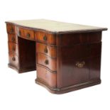 A Chippendale period mahogany twin pedestal desk