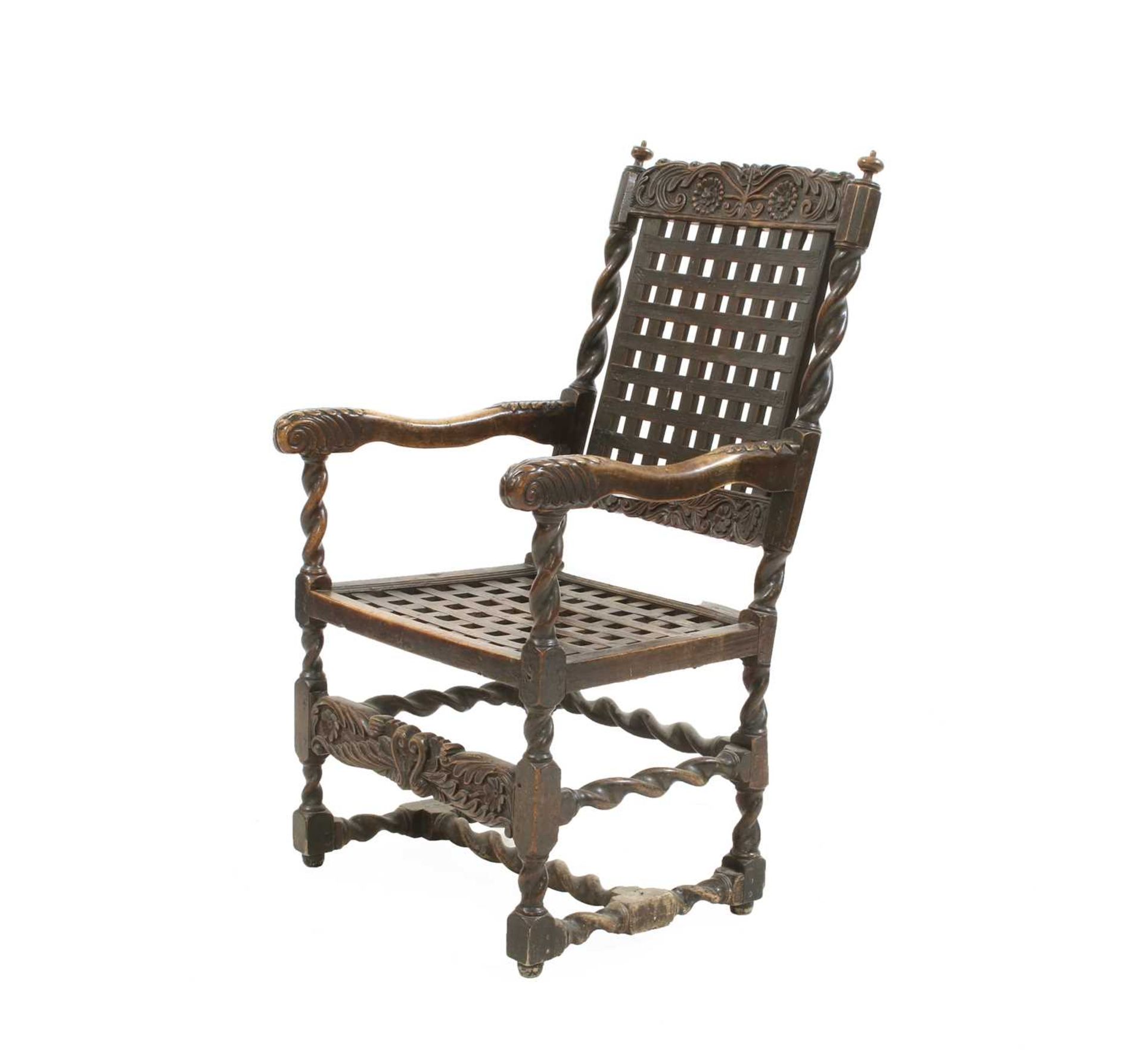 A Charles II walnut open armchair,