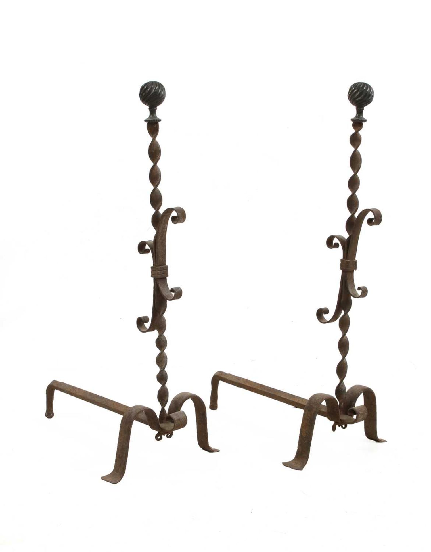 A pair of Italian tall wrought iron fire dogs,