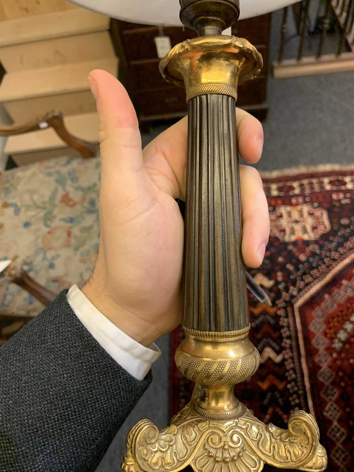 A pair of French Empire-style bronze and gilt-bronze candlesticks, - Image 10 of 19