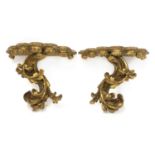 A pair of gilt softwood wall brackets,