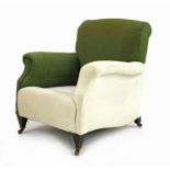 An upholstered easy armchair,