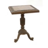 An Indian carved sandalwood chess or games table,