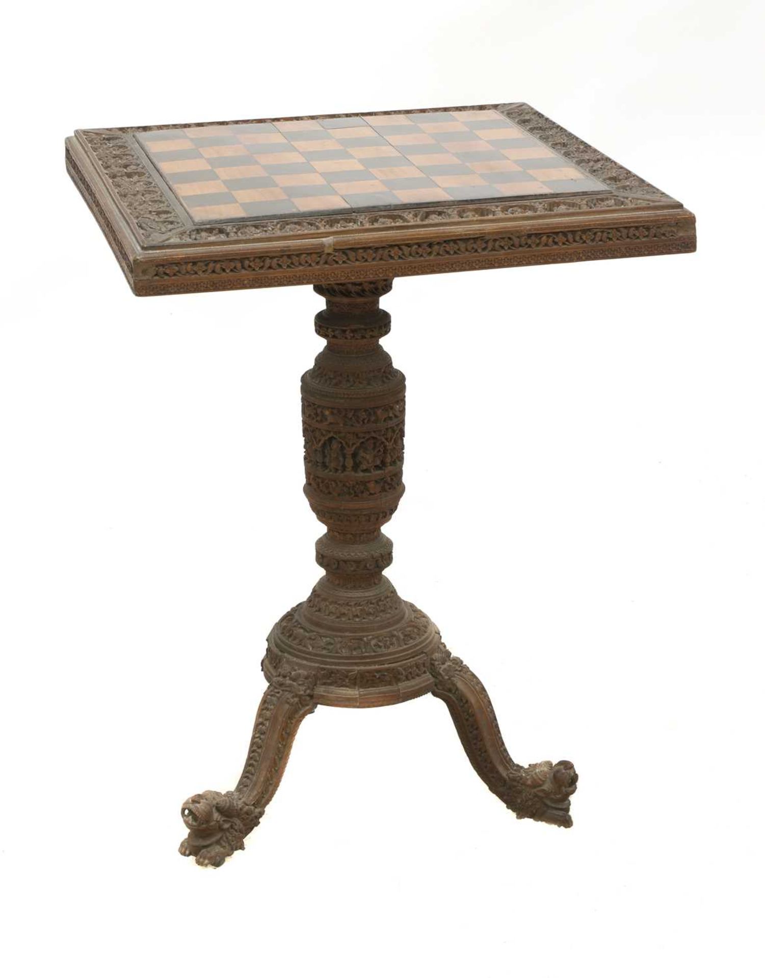 An Indian carved sandalwood chess or games table,