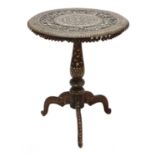 An Indian tripod table,