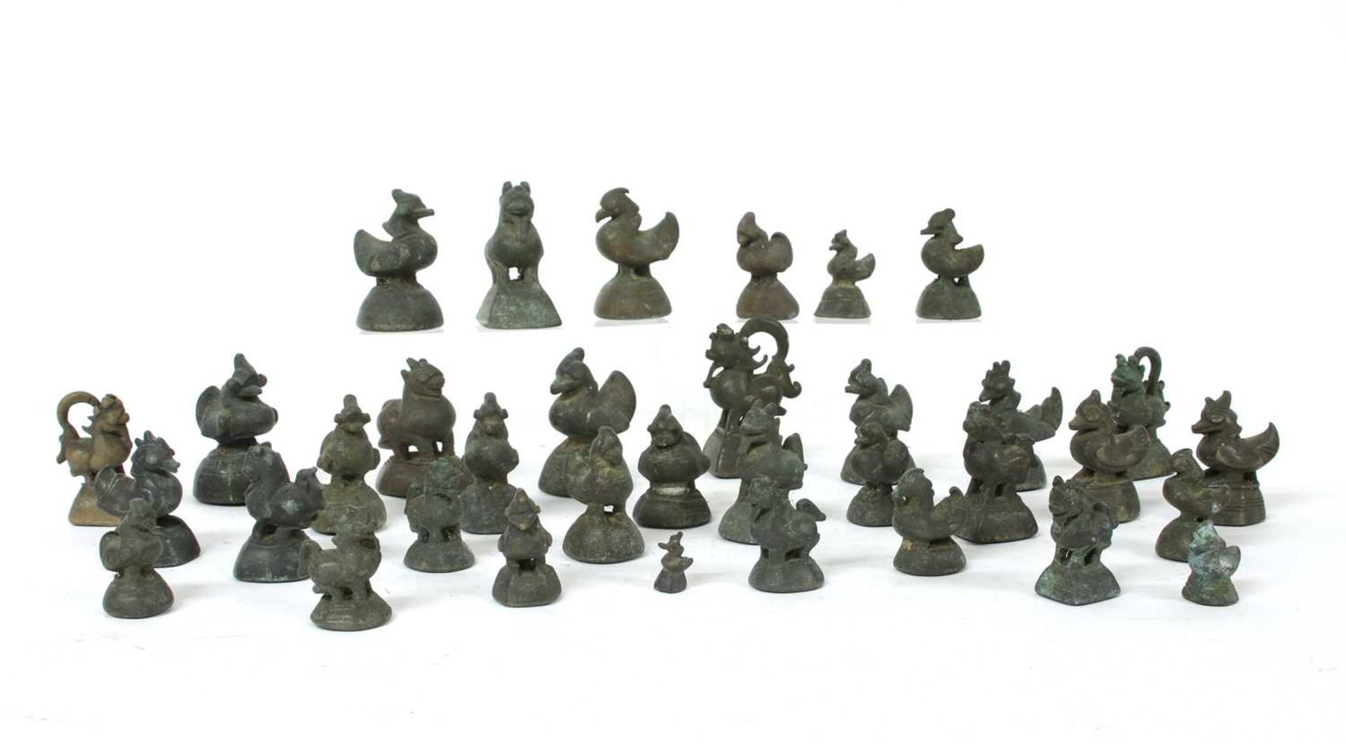 A collection of Burmese bronze opium weights, - Image 2 of 3