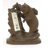 A Black Forest bear desk thermometer,