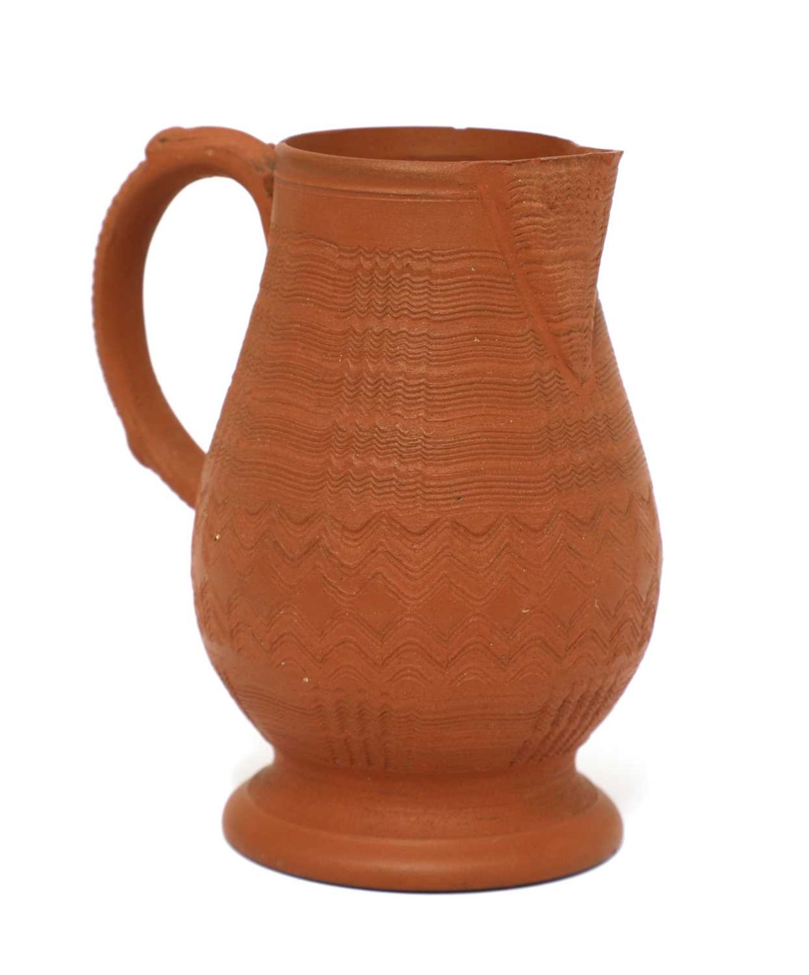 A Staffordshire redware baluster-shaped milk jug,