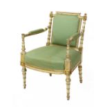 A George III parcel gilt painted armchair,