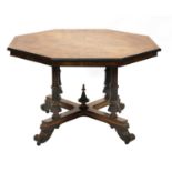 A late Victorian walnut and ebonised octagonal centre table,