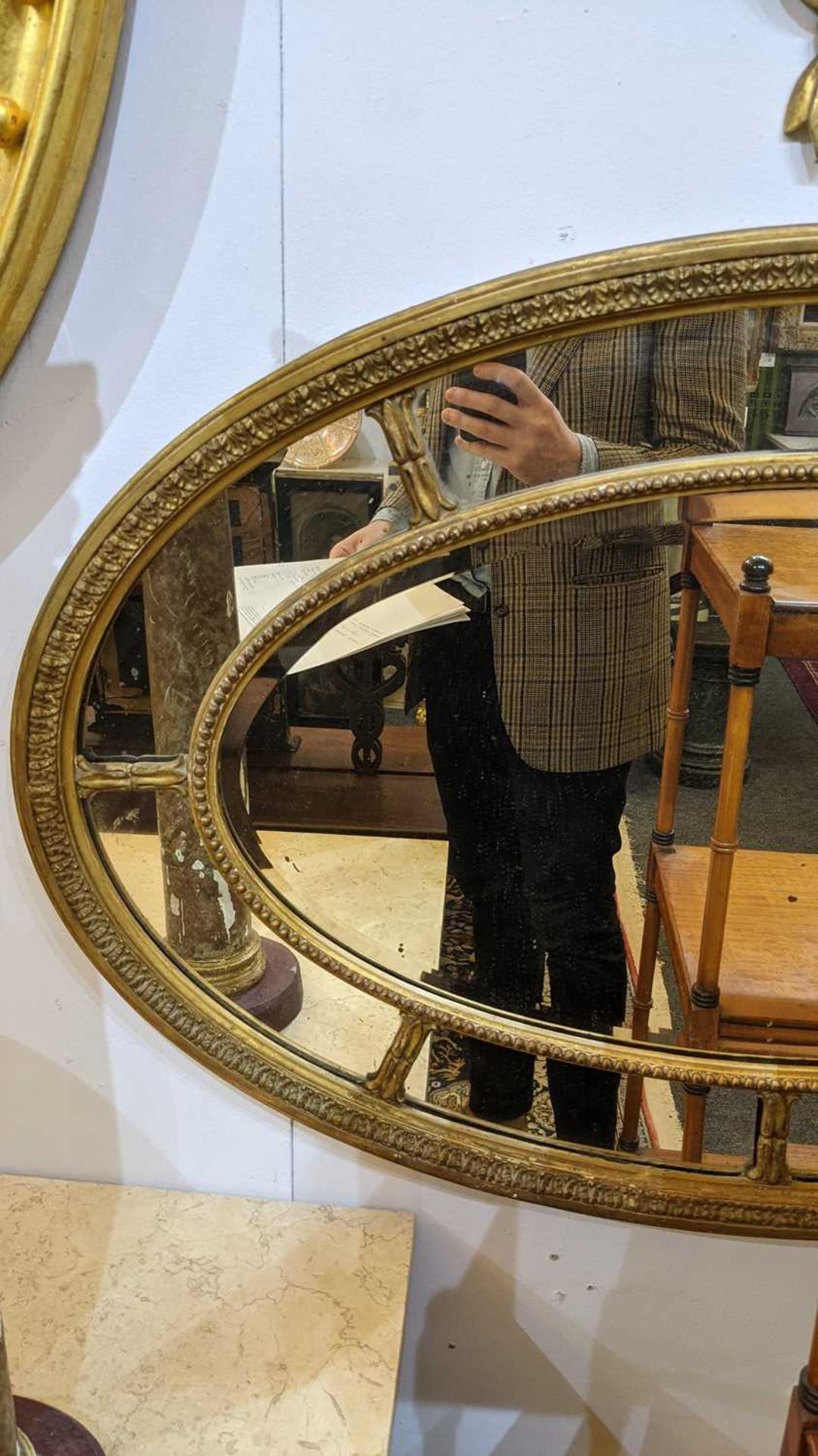 A carved giltwood and gesso oval wall mirror, - Image 7 of 7