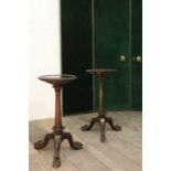 A near pair of Anglo-Indian padouk tripod tables,