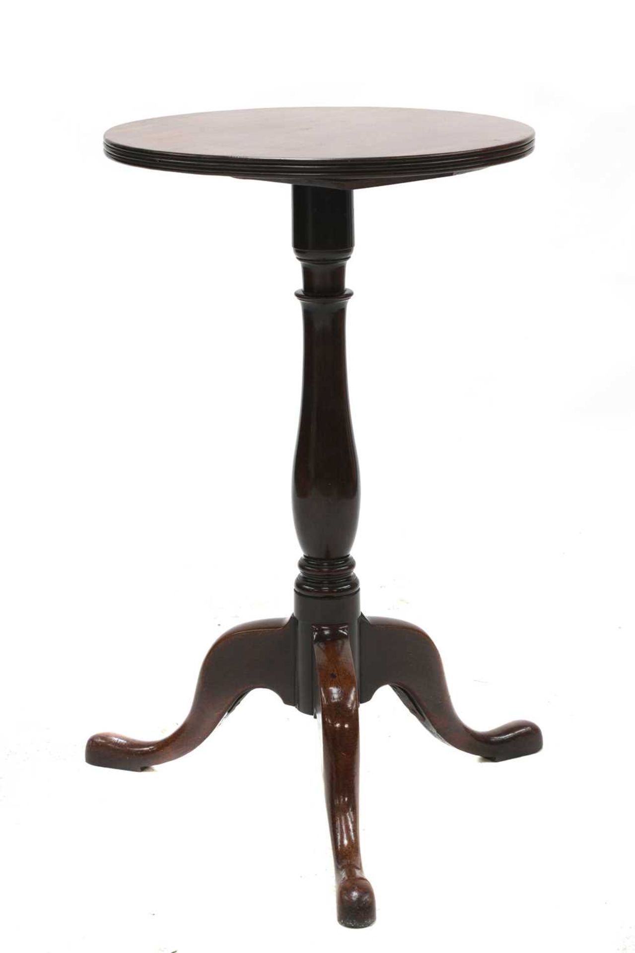 A George III solid mahogany tripod table,