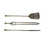 A set of George III brass and steel fire irons,