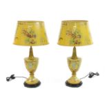 A pair of yellow toleware-style table lamps and shades,