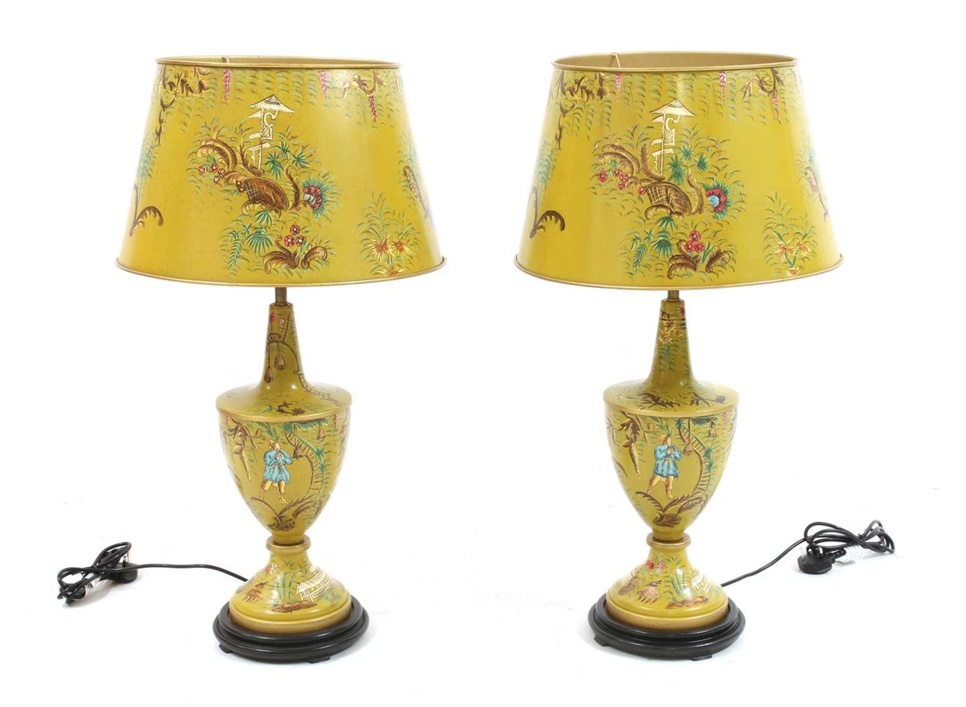 A pair of yellow toleware-style table lamps and shades,