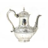 A Victorian silver coffee pot,