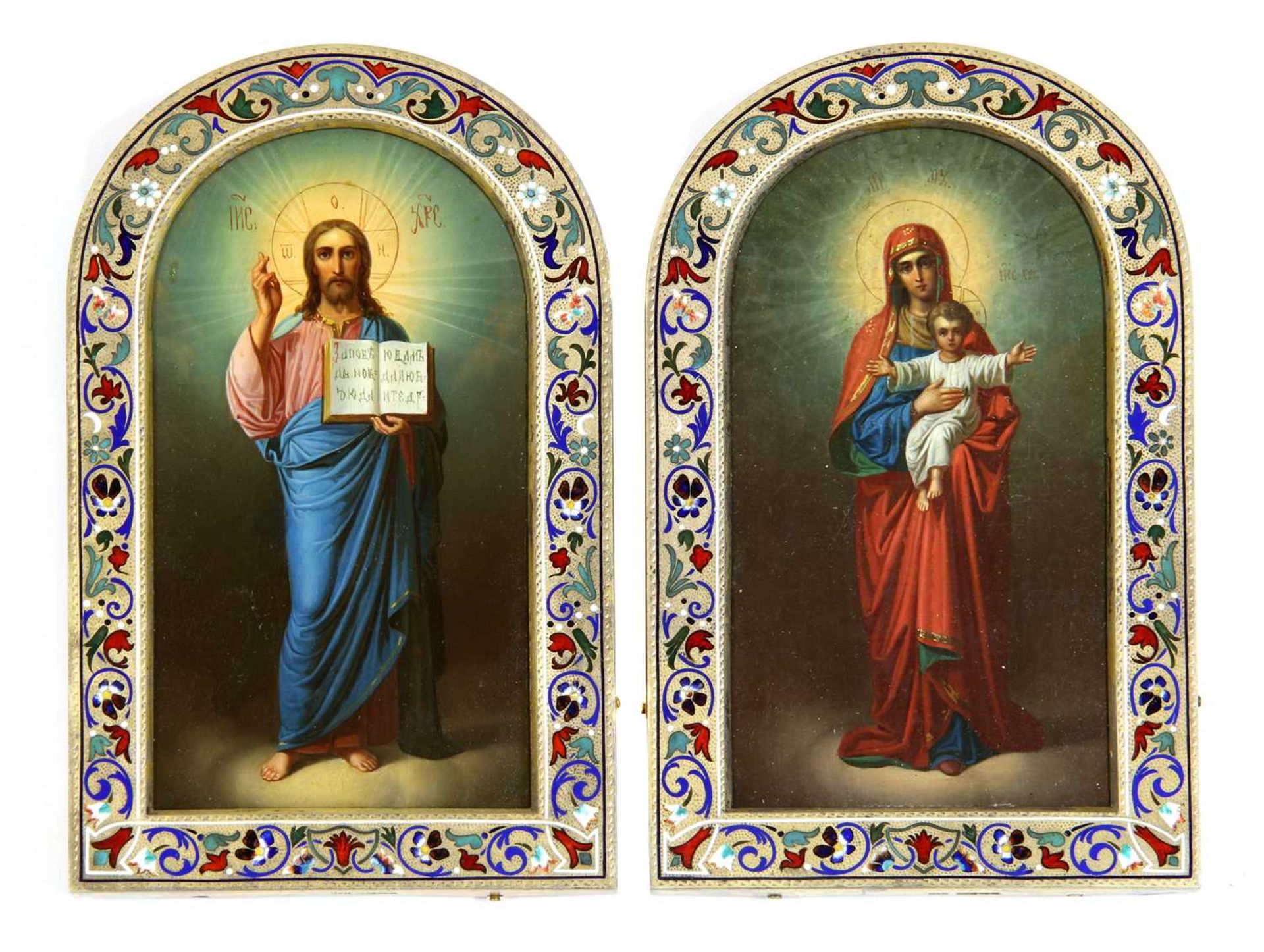 A pair of silver gilt and enamel wedding icons of the Mother of God and Christ Pantocrator,