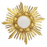 A Spanish giltwood sunburst mirror,