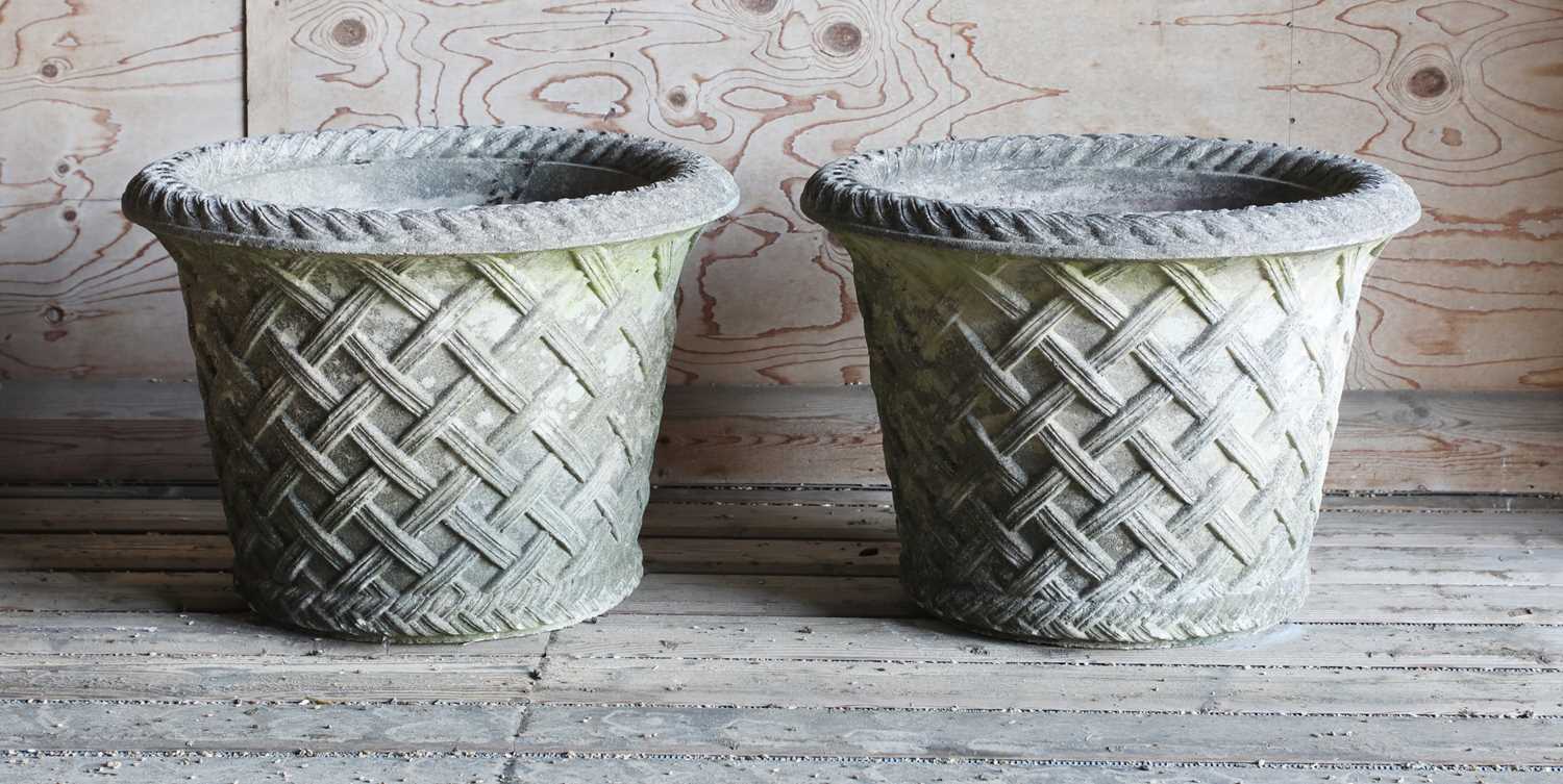 A pair of Haddonstone garden urns,