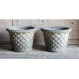 A pair of Haddonstone garden urns,