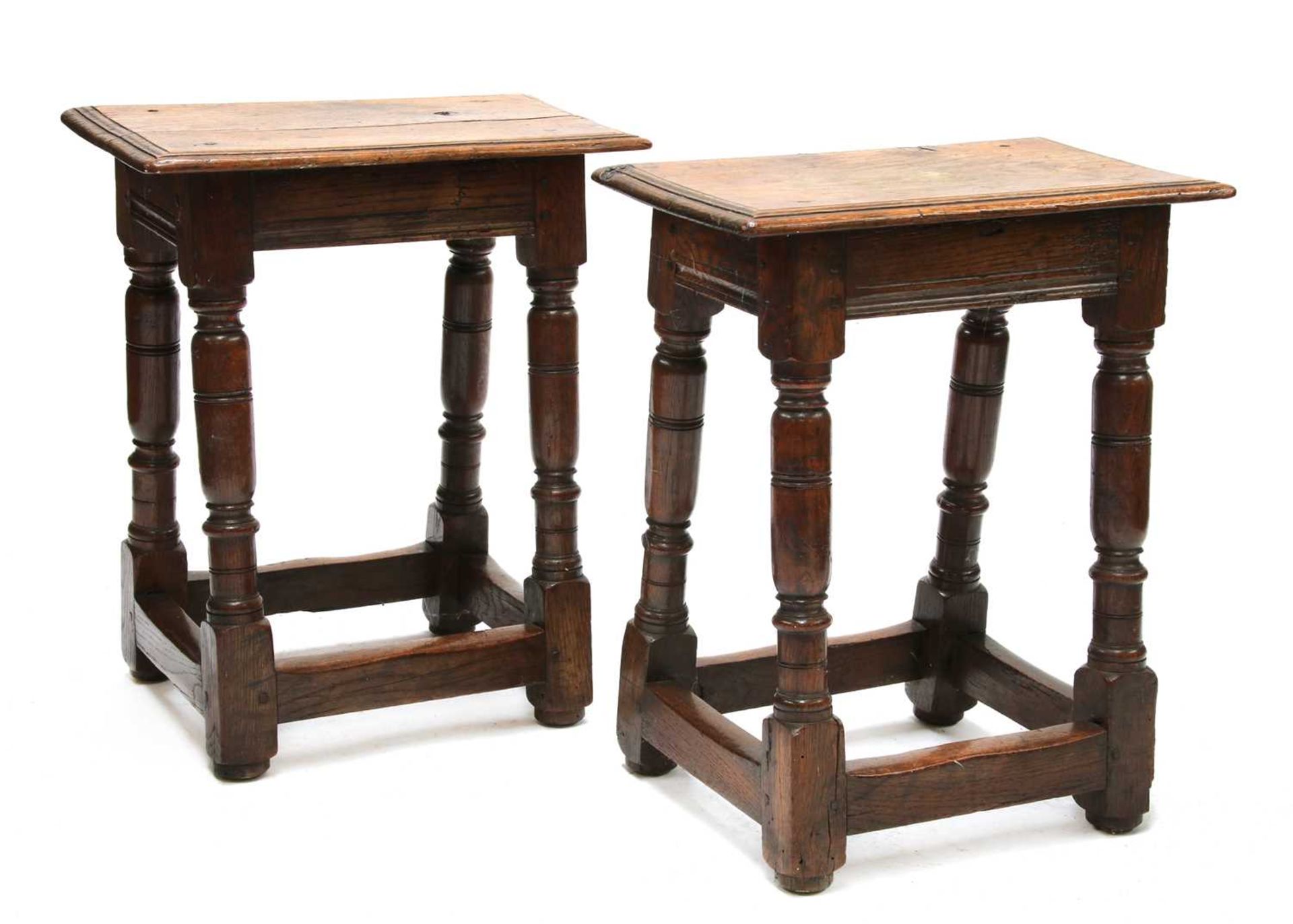 A pair of oak joint stools,