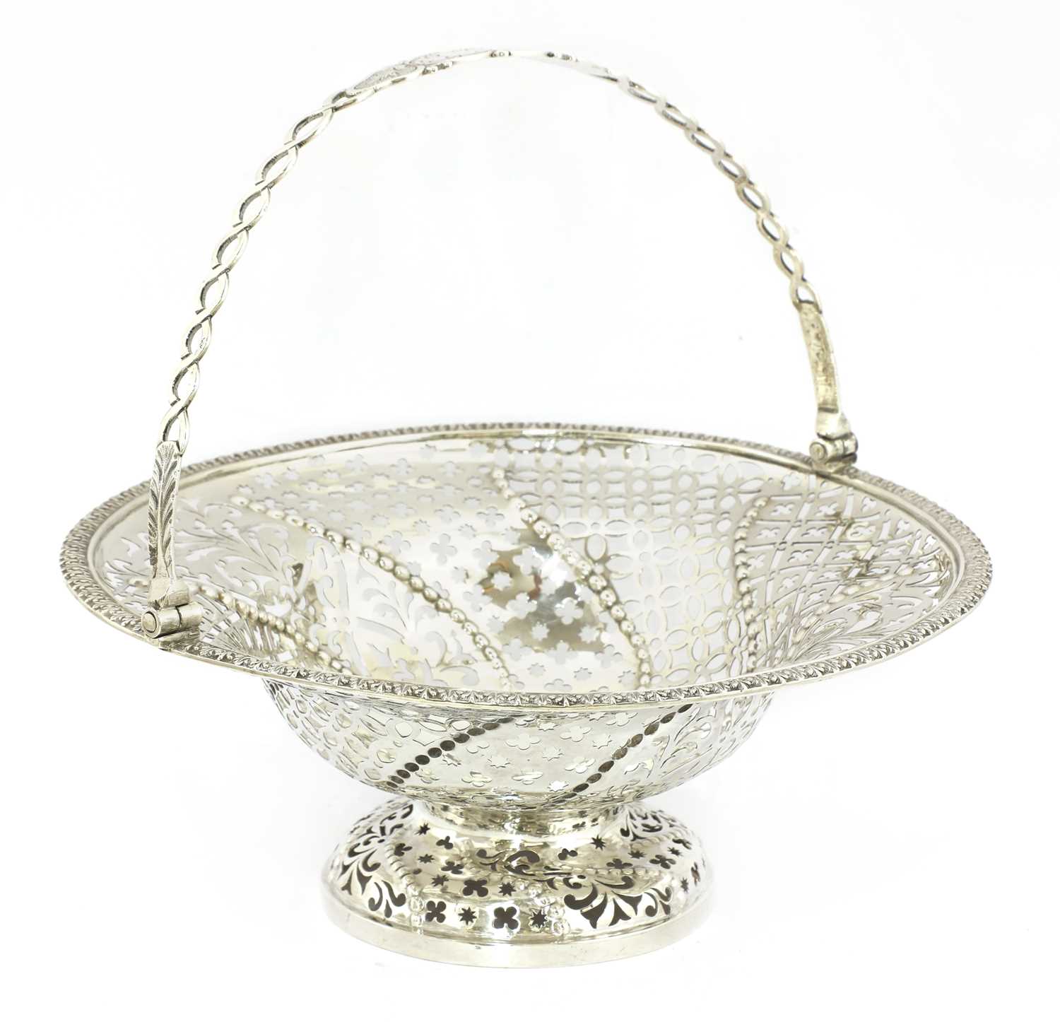 A George III silver cake basket,