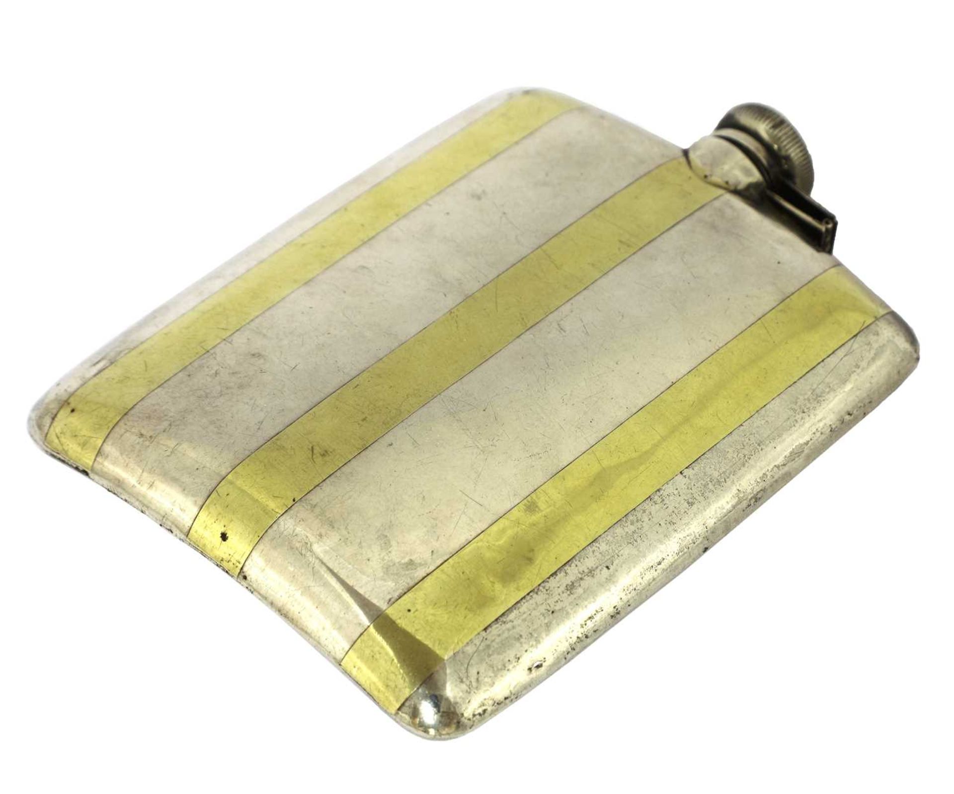 An American Prohibition sterling silver and gold inlay hip flask,