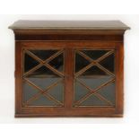 A George III strung mahogany cabinet,