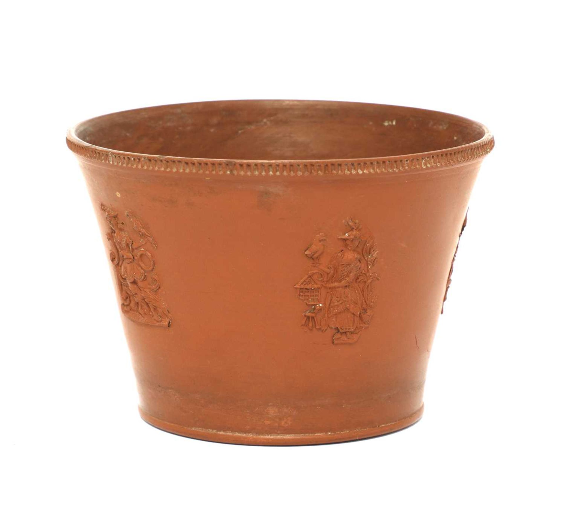 An unusual Staffordshire redware flared flowerpot,