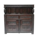 A carved oak buffet cupboard,