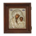 A silver gilt and enamel icon of the Mother of God of Kazan,