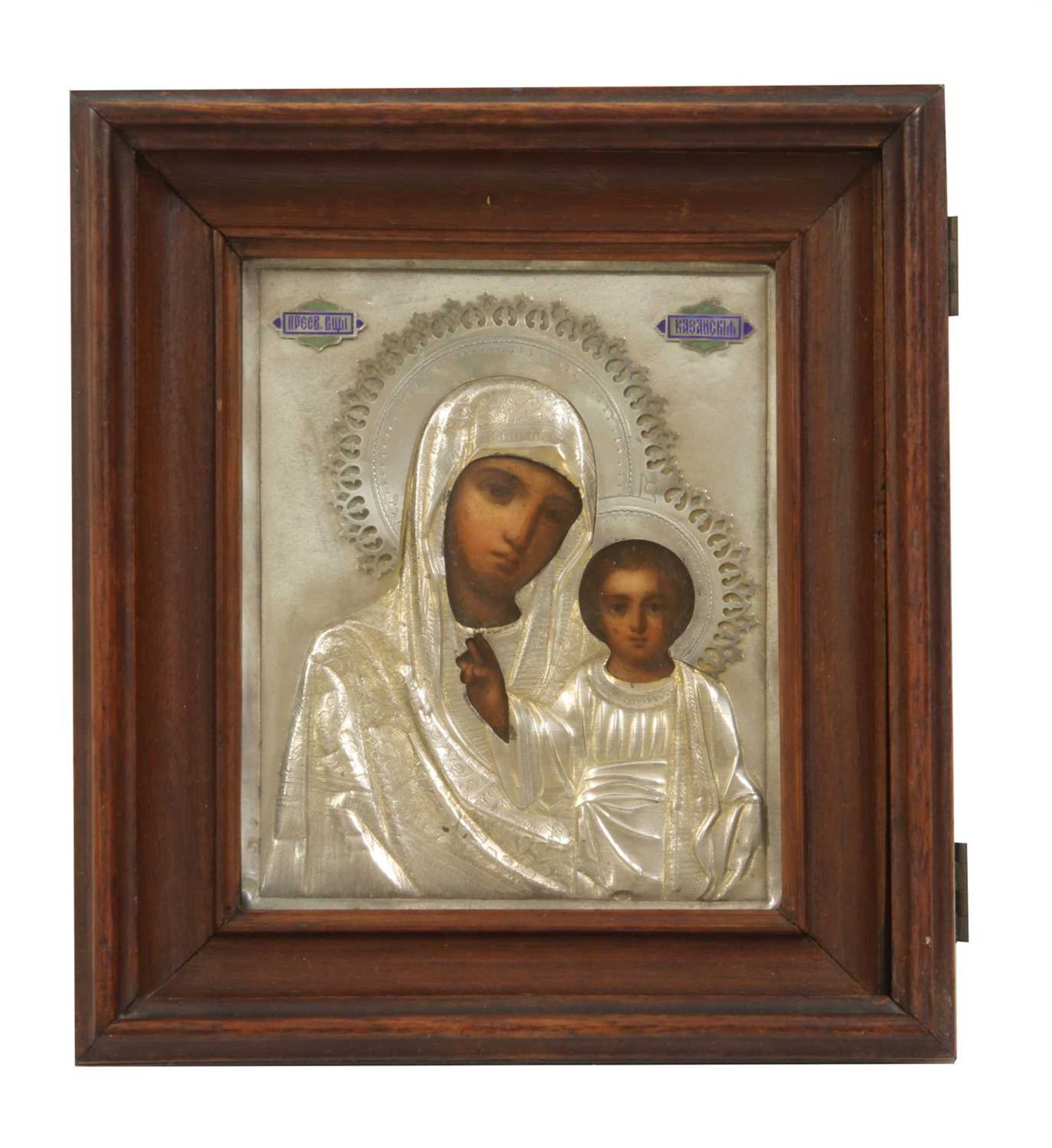 A silver gilt and enamel icon of the Mother of God of Kazan,