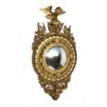 A William IV-style giltwood convex wall mirror,