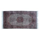 A Persian Tabriz rug,