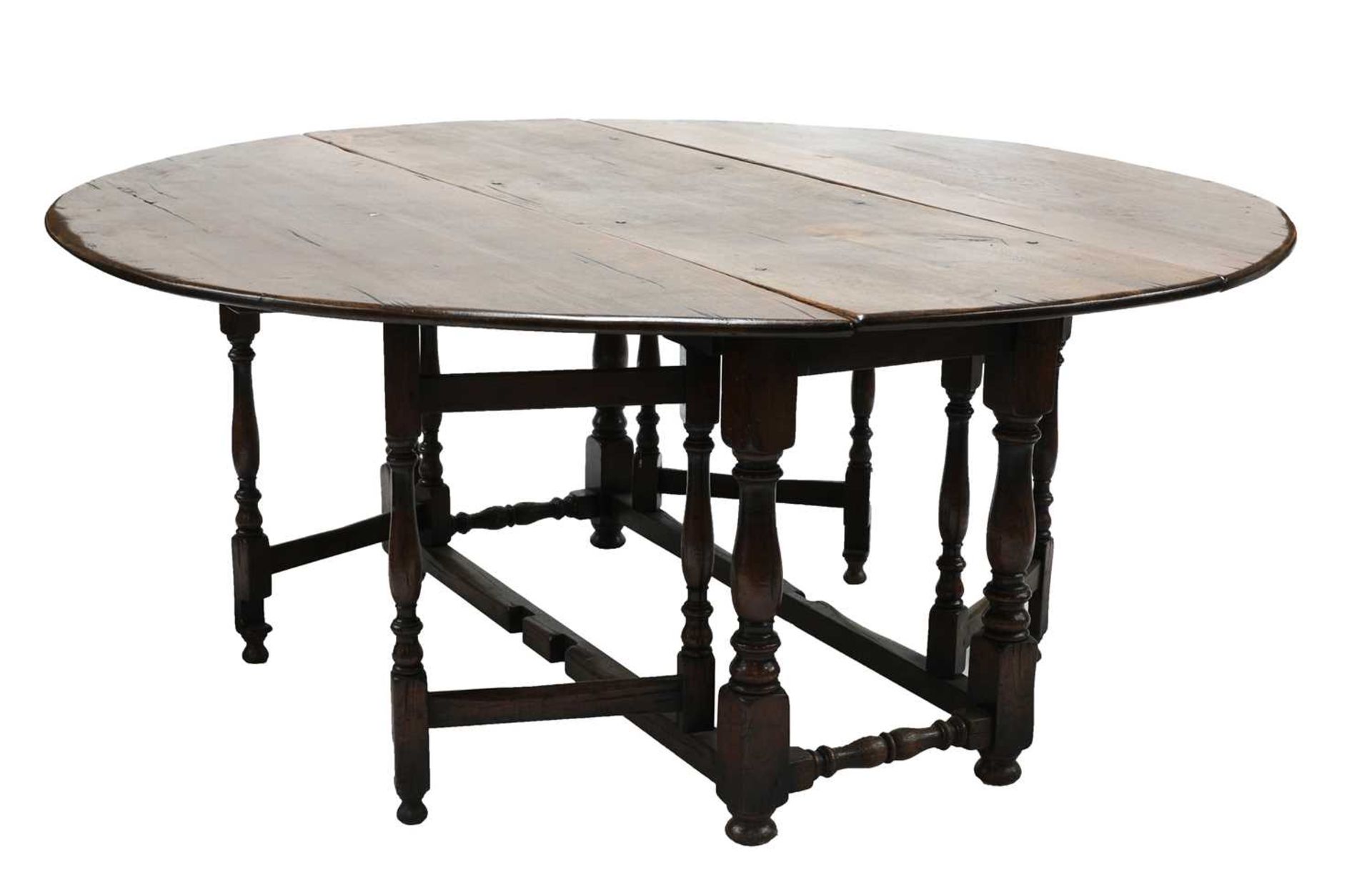 A large oak gateleg table,