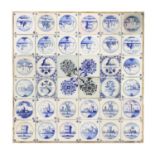 A panel of thirty-six delftware blue and white tiles,