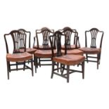 A set of eight Hepplewhite-style mahogany dining chairs,