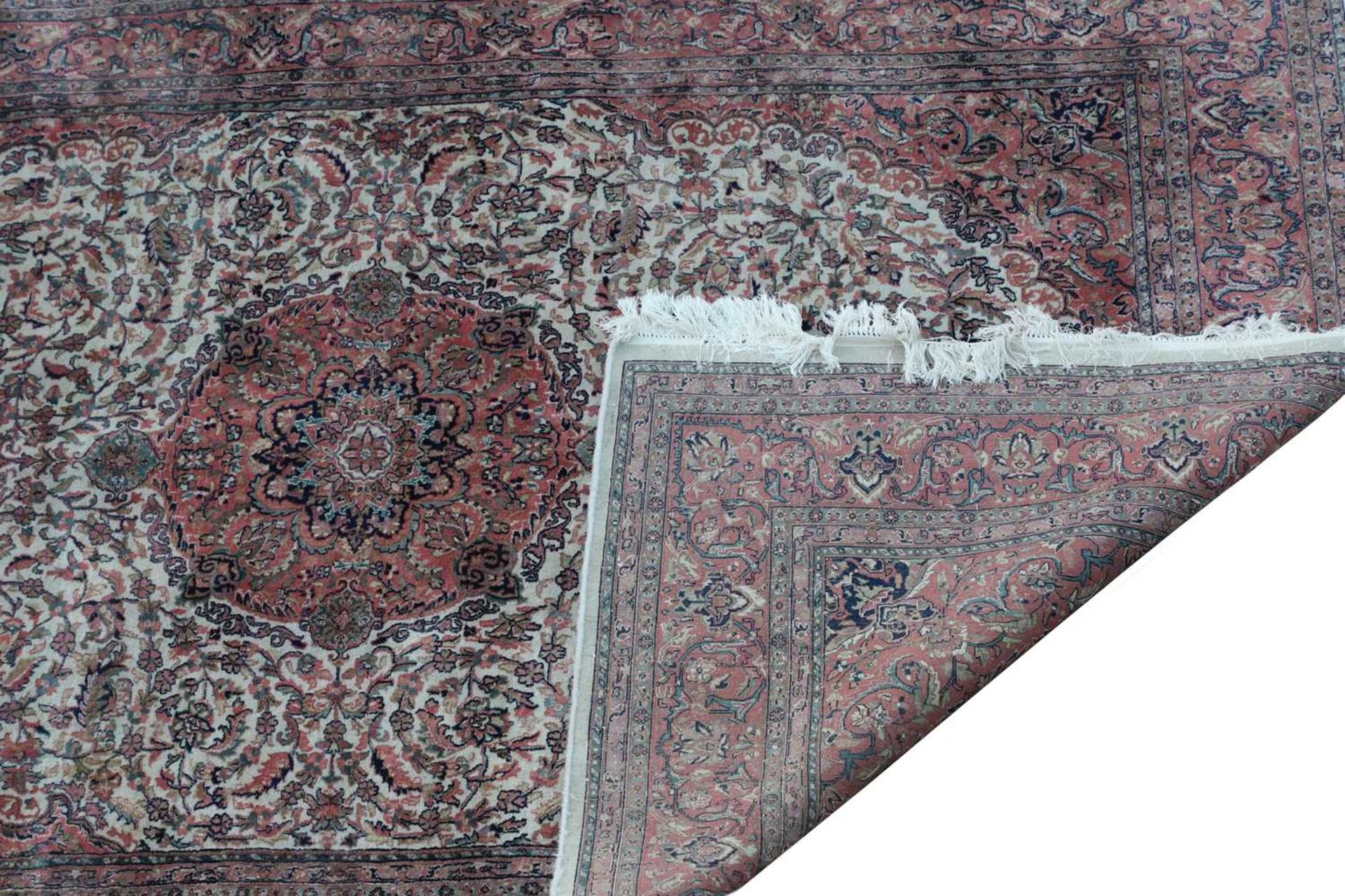 A Persian Tabriz rug, - Image 2 of 2