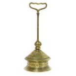 An Aesthetic Movement brass door porter,