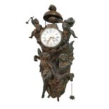 A French gilt-bronze cartel clock,