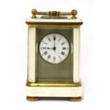 A brass and ivory miniature carriage clock,