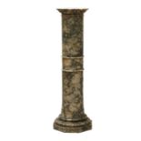 A variegated marble pedestal,