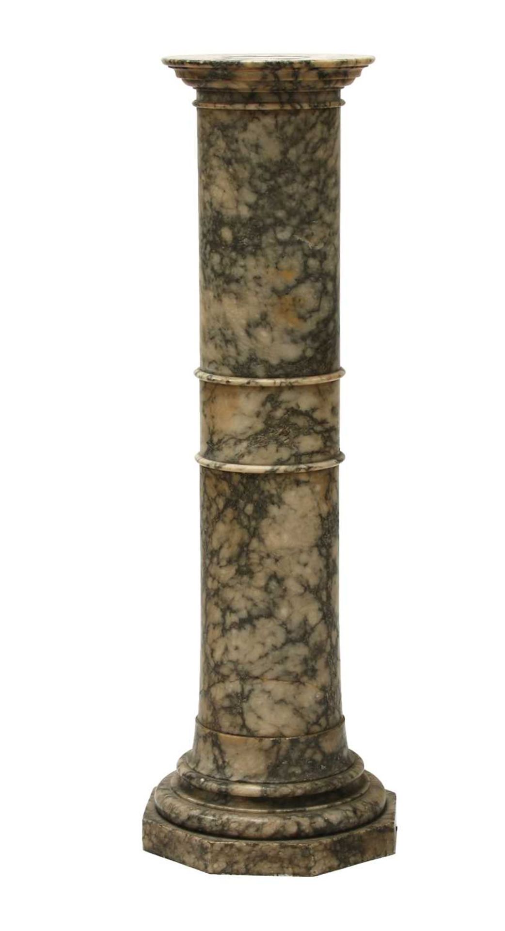 A variegated marble pedestal,