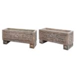 A pair of Indian sandstone garden troughs,